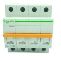 Schneider Electric 32A 4-pole C32 MCB front face with orange toggle switch and 10000A rating