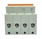 Top wiring terminal view of Schneider 32A 4-pole breaker showing connection ports and schematic