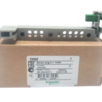 Schneider 33095 1600A sensor plug resting on original packaging box