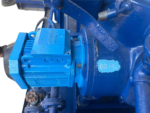 Close-up of 60 Hz ABB electric motor attached to Alfa Laval MAB 104B-24 centrifugal separator casing