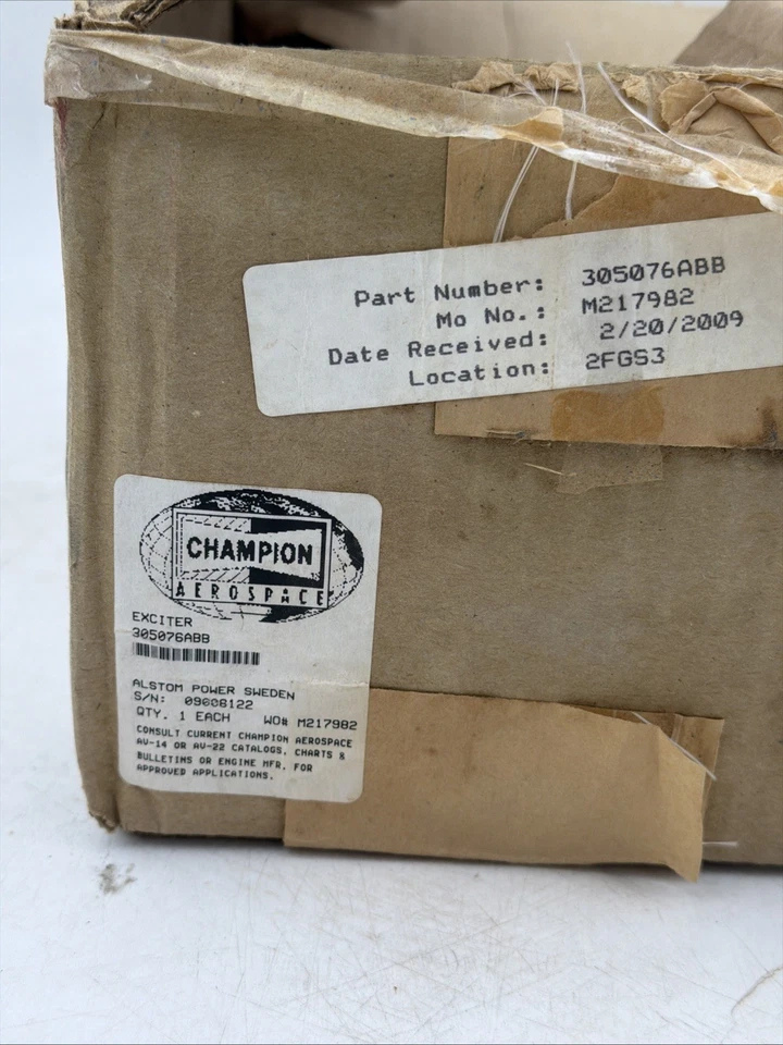 Champion Aerospace 2404819-1 Ignition Exciter1 Original packaging box and part label for Champion Aerospace ignition exciter 305076ABB