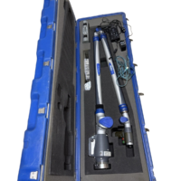 FARO Platinum P12 7-axis CMM measuring arm stored in blue hard transit case with power supply and USB cable.