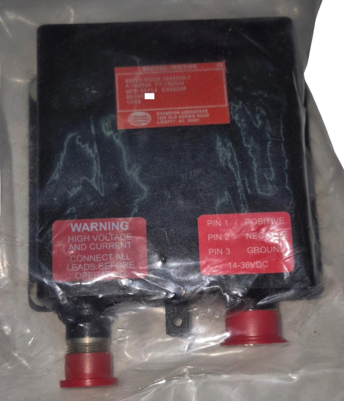 Honeywell 3888058-7 Ignition Exciter Overview Honeywell 3888058-7 Ignition Exciter unit with terminal layout and warning label