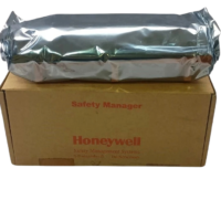 Honeywell FC-PDB-ARTF05 Safety Manager board sealed in ESD foil packaging resting on original factory carton