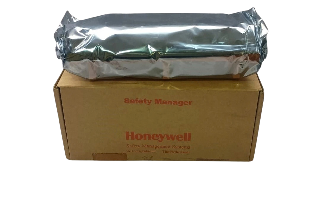 Honeywell FC-PDB-ARTF051 Honeywell FC-PDB-ARTF05 Safety Manager board sealed in ESD foil packaging resting on original factory carton