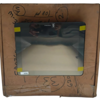 Front view of Kongsberg DISP-E-MFD marine multi-function display panel in unboxing cardboard packaging