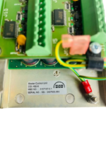 Close up of MAN B&W 3157167-5.1 Master Control Unit serial label and grounding wire