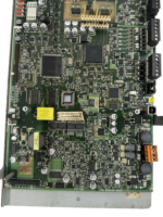Close-up of Honeywell NFS-320E circuit board showing firmware label and microcontrollers