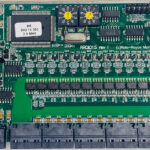 Macro view of Rolls Royce RRDIO15 Rev I rotary address dials and SMD optocoupler array