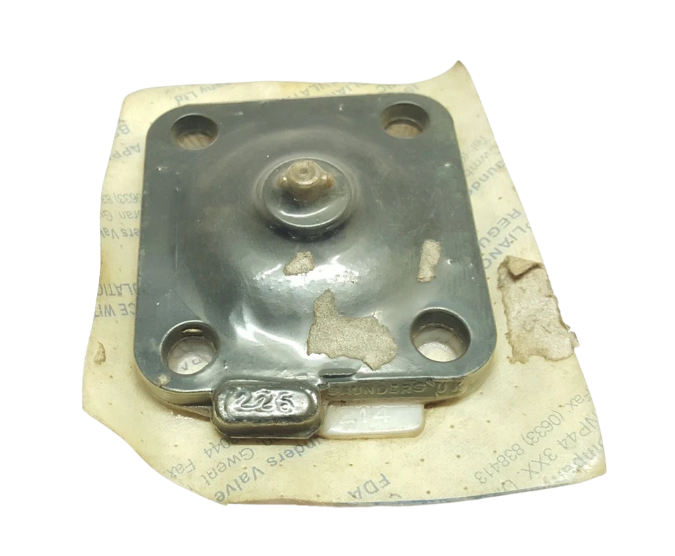 Saunders 226 diaphragm1 Saunders 226 diaphragm damper membrane showing four bolt holes and center attachment stud
