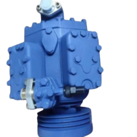 Bock F4 4-cylinder reciprocating compressor side view with V-belt drive pulley and cylinder head