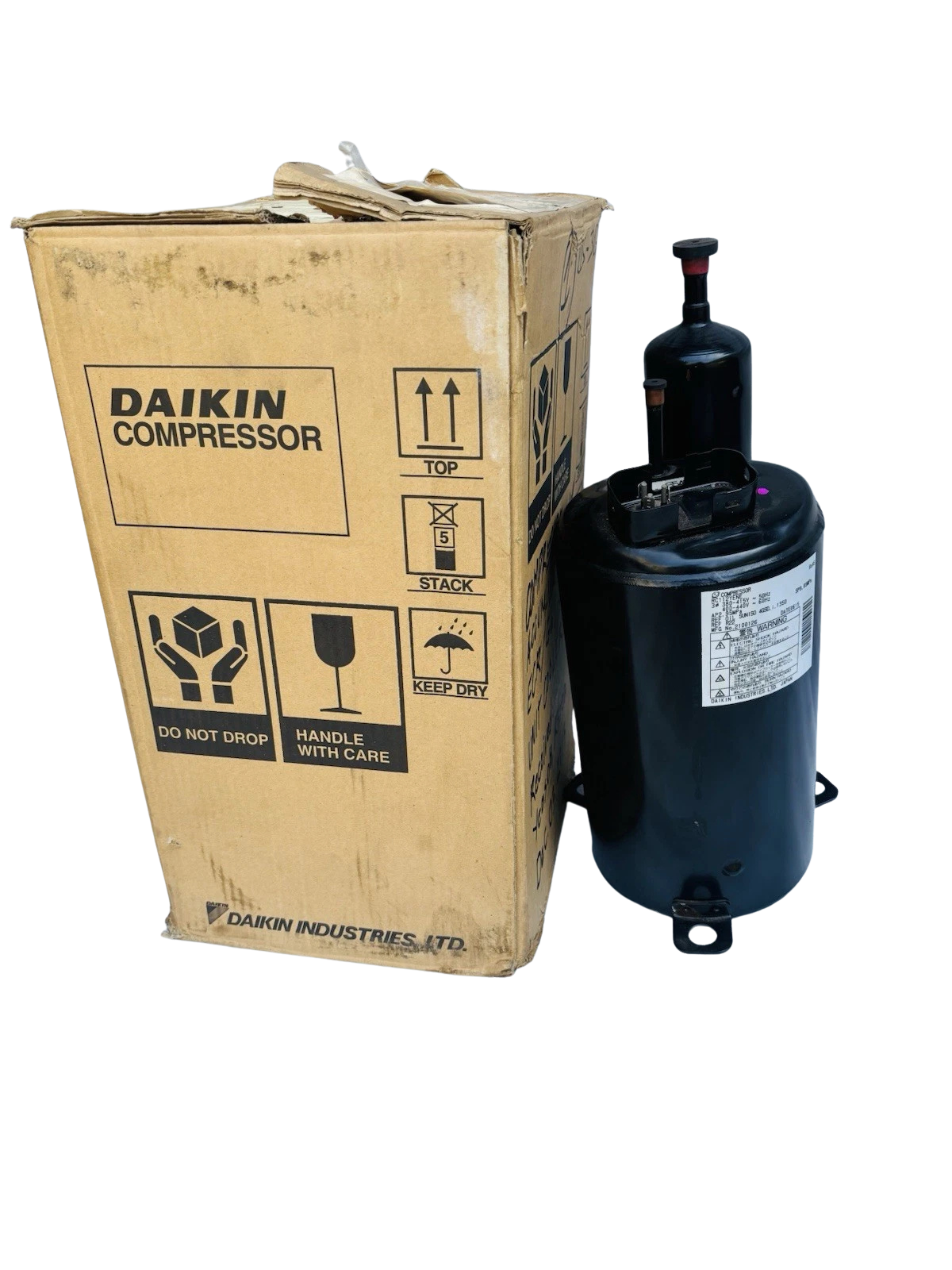 Daikin RC112YENE compressor Daikin RC112YENE hermetic refrigeration compressor standing next to original Daikin factory box