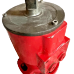 Right-side view of a red Damcos BRC hydraulic actuator, showing its bolted base.