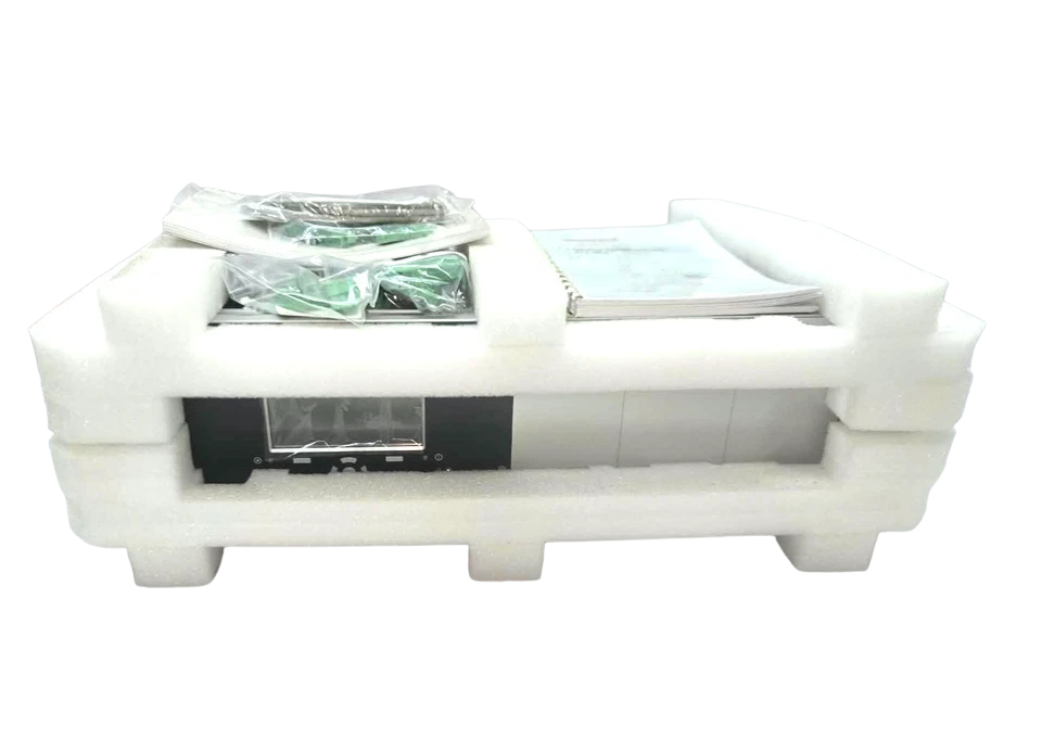 Honeywell enCore FC-MC1 Flow Computer Honeywell enCore FC-MC1 flow computer packed in foam inserts with manual and connectors