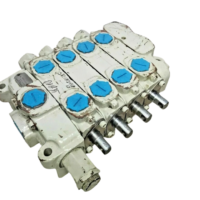 Parker Commercial DVA35 4-spool hydraulic directional control valve with clevis spools and capped ports.